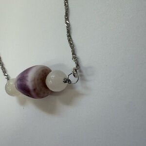 Handcrafted silver cone shell necklace with clear quartz beads
